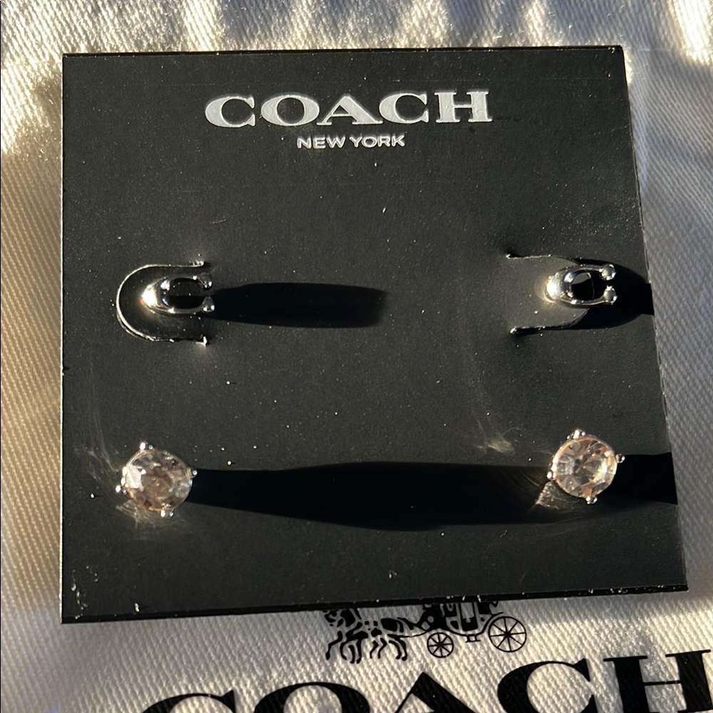 # 59 Coach Silver Delicate Signature and Stud Earrings